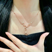 CD 26S CRYSTAL ROSE BRANCH PENDANT NECKLACE IN ROSE GOLD TONE METAL 631896