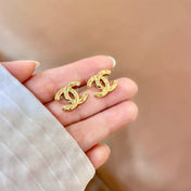CHANEL 26S CHANEL CC LOGO WOVEN METAL STUD EARRINGS IN GOLD METAL 633305
