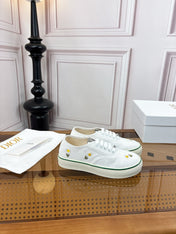 DIOR 26S LOW TOP SNEAKERS IN WHITE CANVAS WITH DAISY EMBROIDERY