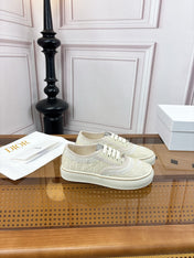DIOR 26S LOW TOP SNEAKERS IN BEIGE CANVAS WITH WHITE LACE TRIM & LOGO PRINT