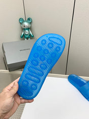 POOL SLIDE SANDAL IN JELLY BLUE RUBBER