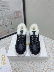 CHLOÉ 26S WEDGE SOLE SNEAKERS IN BLACK CALFSKIN