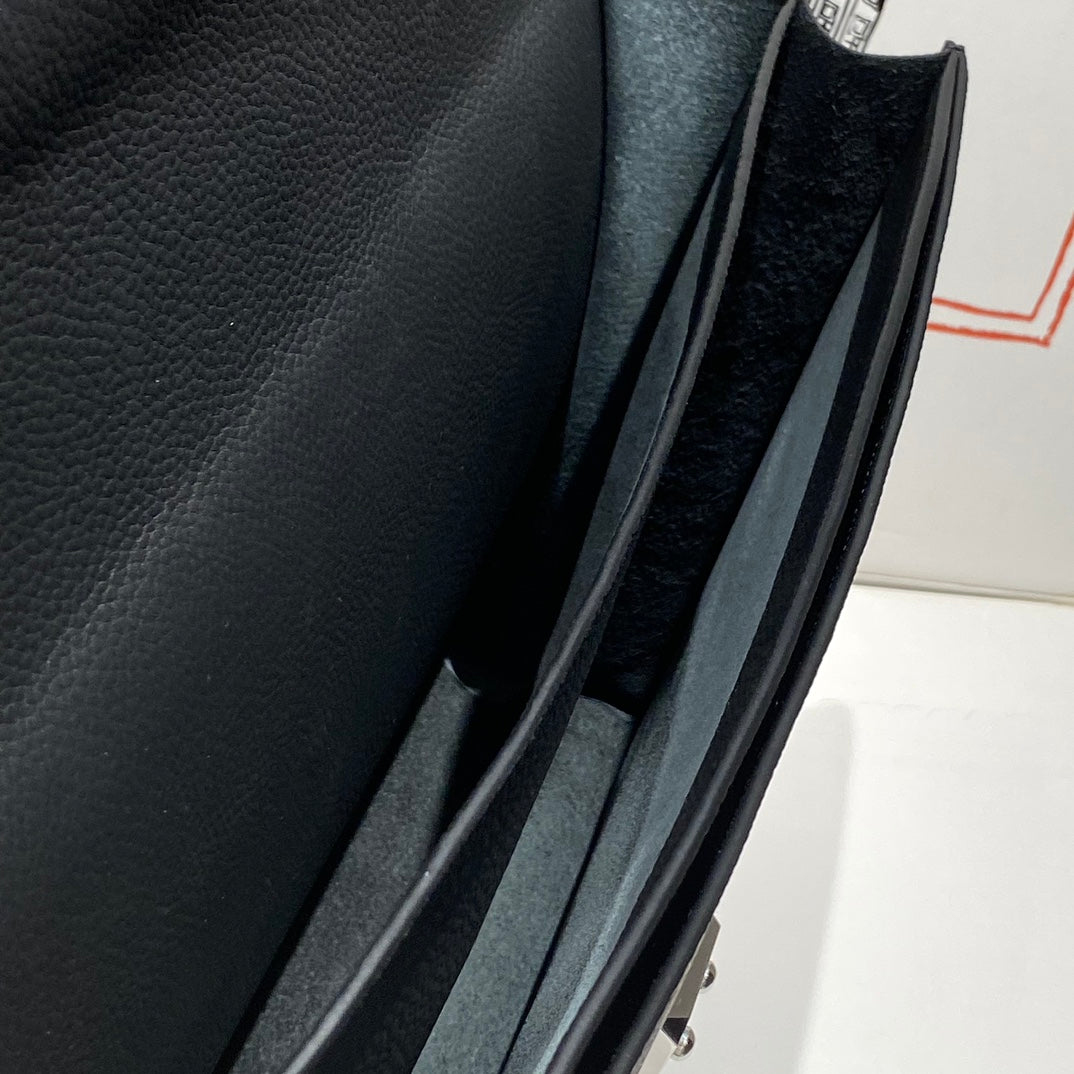 SAC A DEPECHES LIGHT 38 IN BLACK TOGO CALFSKIN