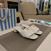 PRADA 26S LOW HEEL OPEN TOE MULES 45MM IN WHITE QUILTED CALFSKIN WITH LOGO