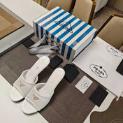 PRADA 26S MULE SANDALS 75MM IN WHITE CALFSKIN AND MESH GOLD HARDWARE