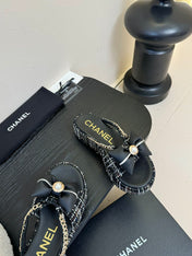 PLATFORM FLIP-FLOPS IN BLACK TWEED FABRIC
