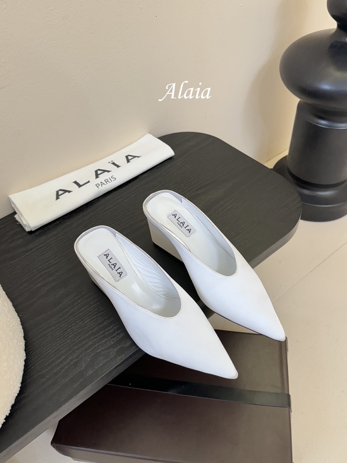 ALAIA HIGH MULES 25S IN WHITE SATIN