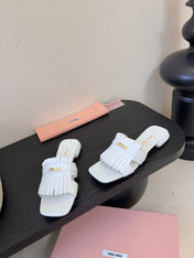 MIUMIU 26S FLAT SLIPPERS IN WHITE CALFSKIN