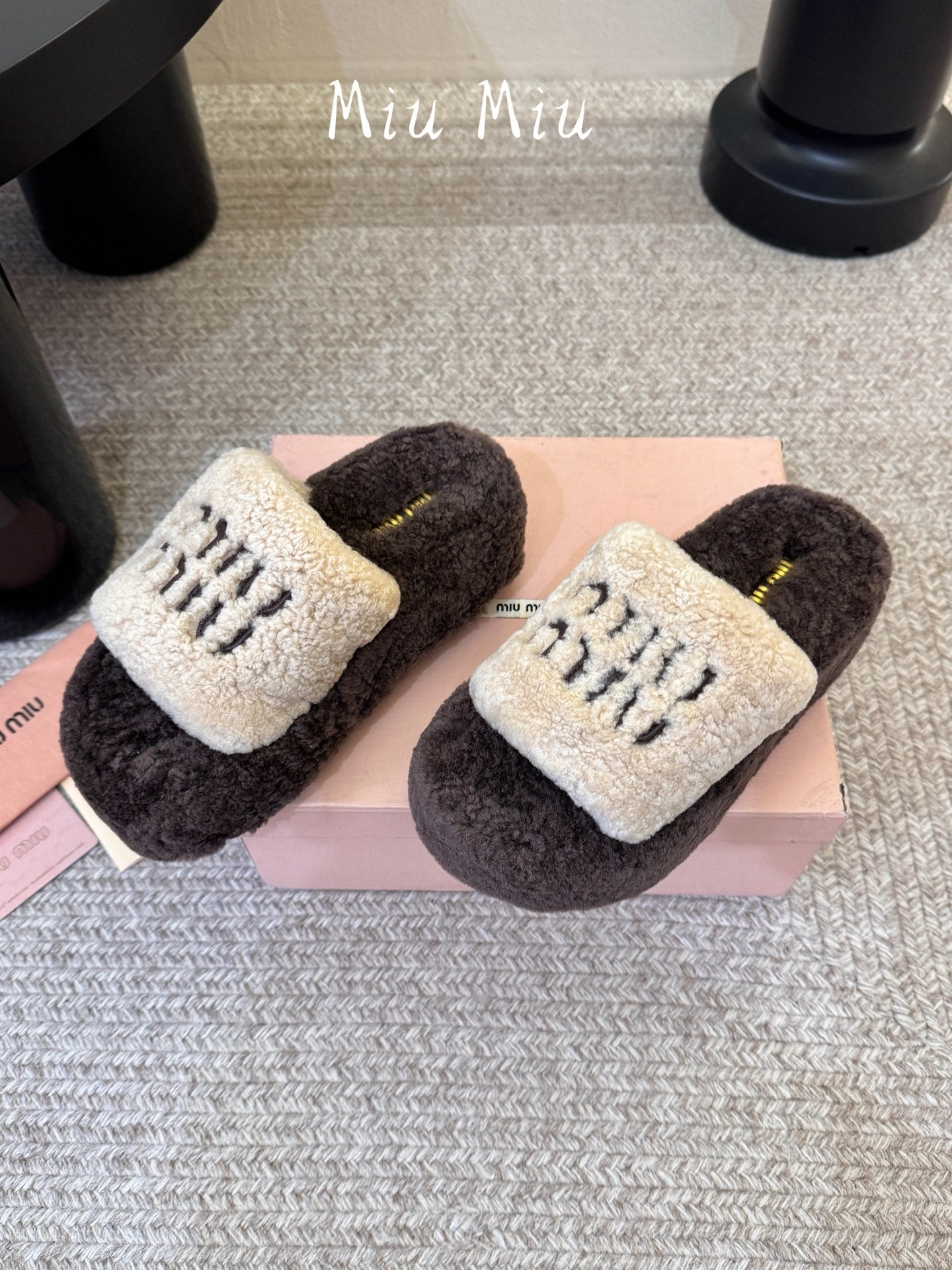 MIUMIU 26S PLATFORM SLIDES IN DARK BROWN AND BEIGE SHEARLING