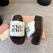 MIUMIU 26S PLATFORM SLIDES IN DARK BROWN AND WHITE SHEARLING