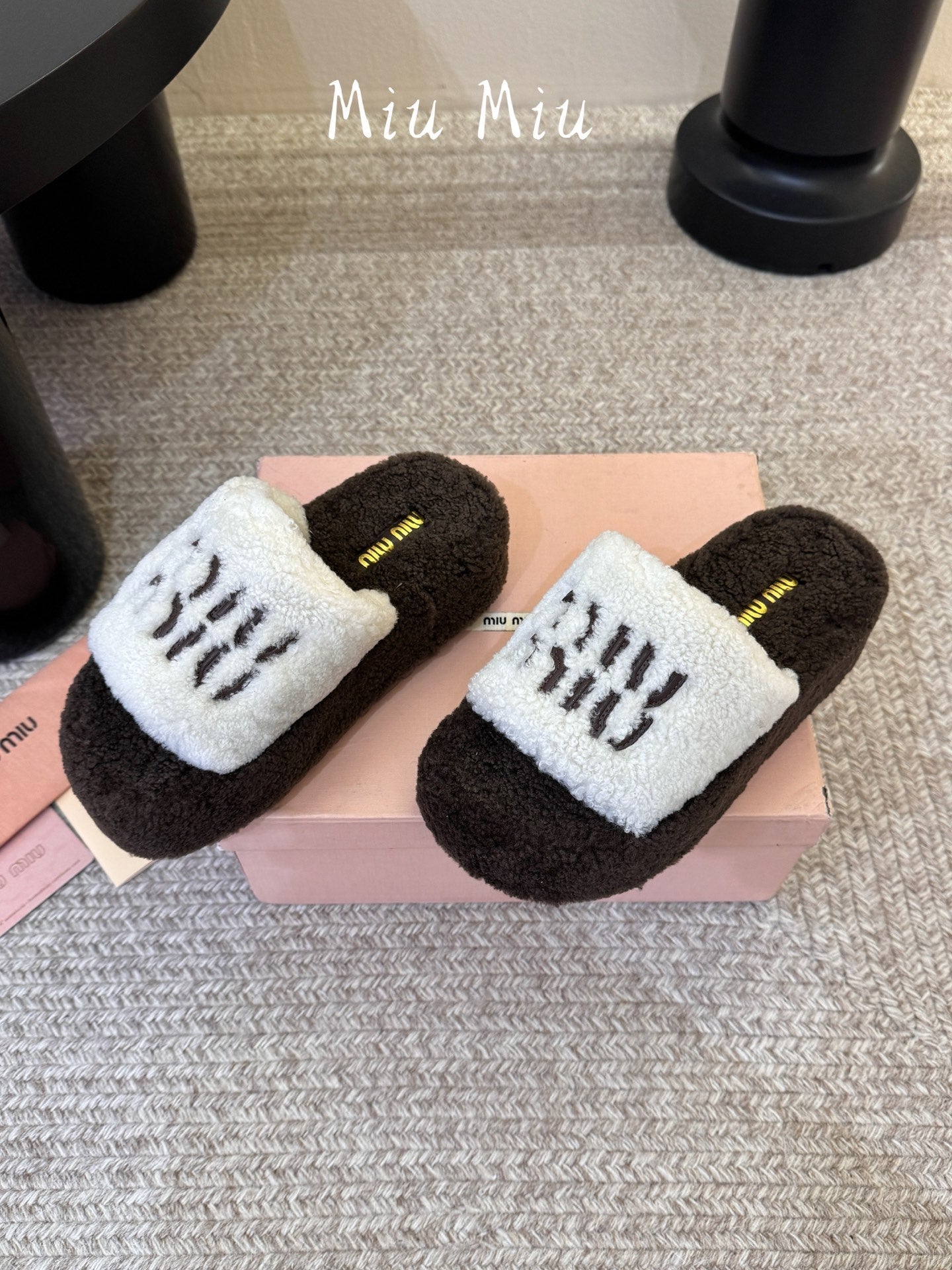 MIUMIU 26S PLATFORM SLIDES IN DARK BROWN AND WHITE SHEARLING