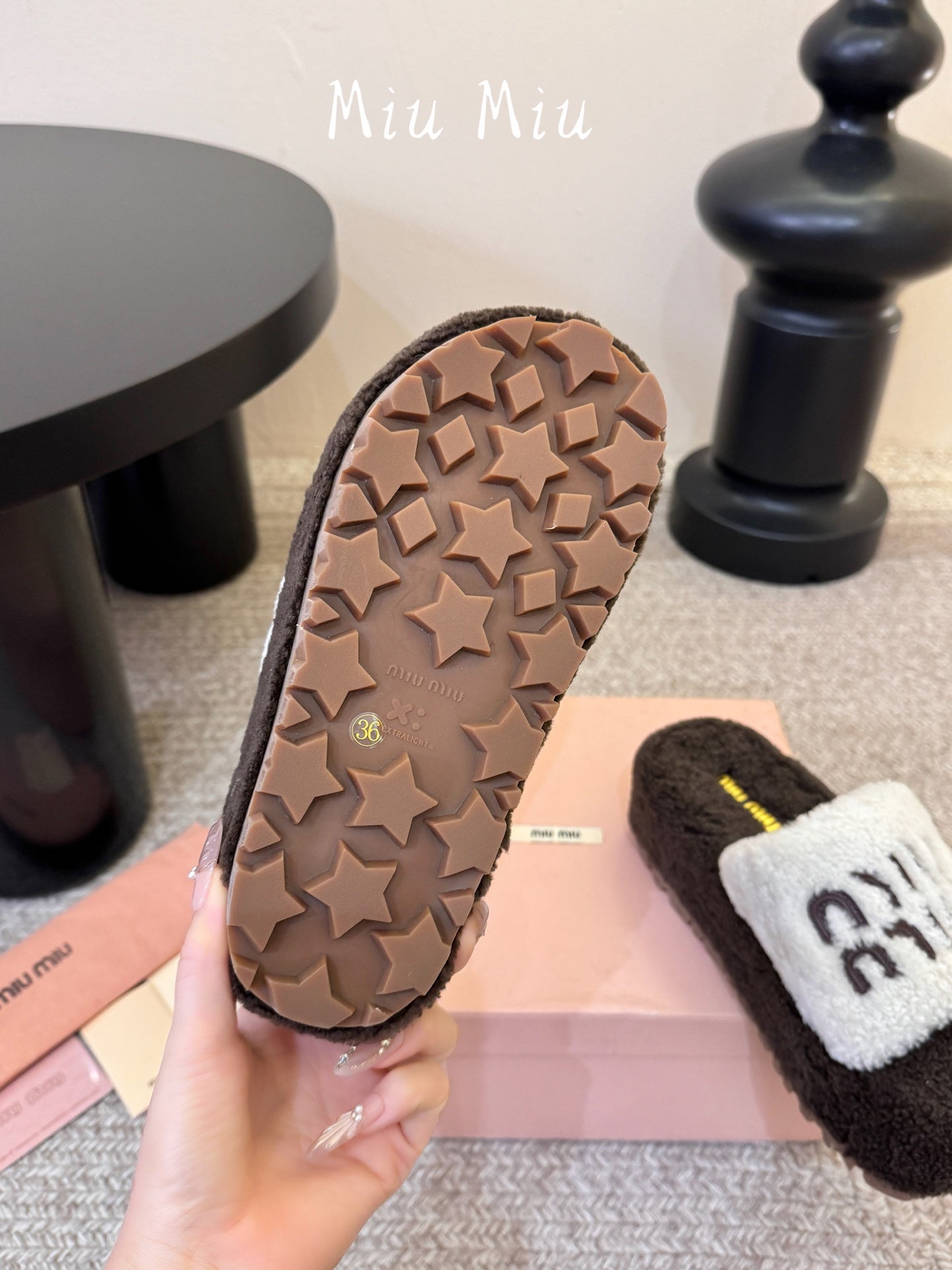 MIUMIU 26S PLATFORM SLIDES IN DARK BROWN AND WHITE SHEARLING
