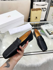 THE ROW 26S PENNY LOAFER FLATS IN BLACK GRAINED CALFSKIN