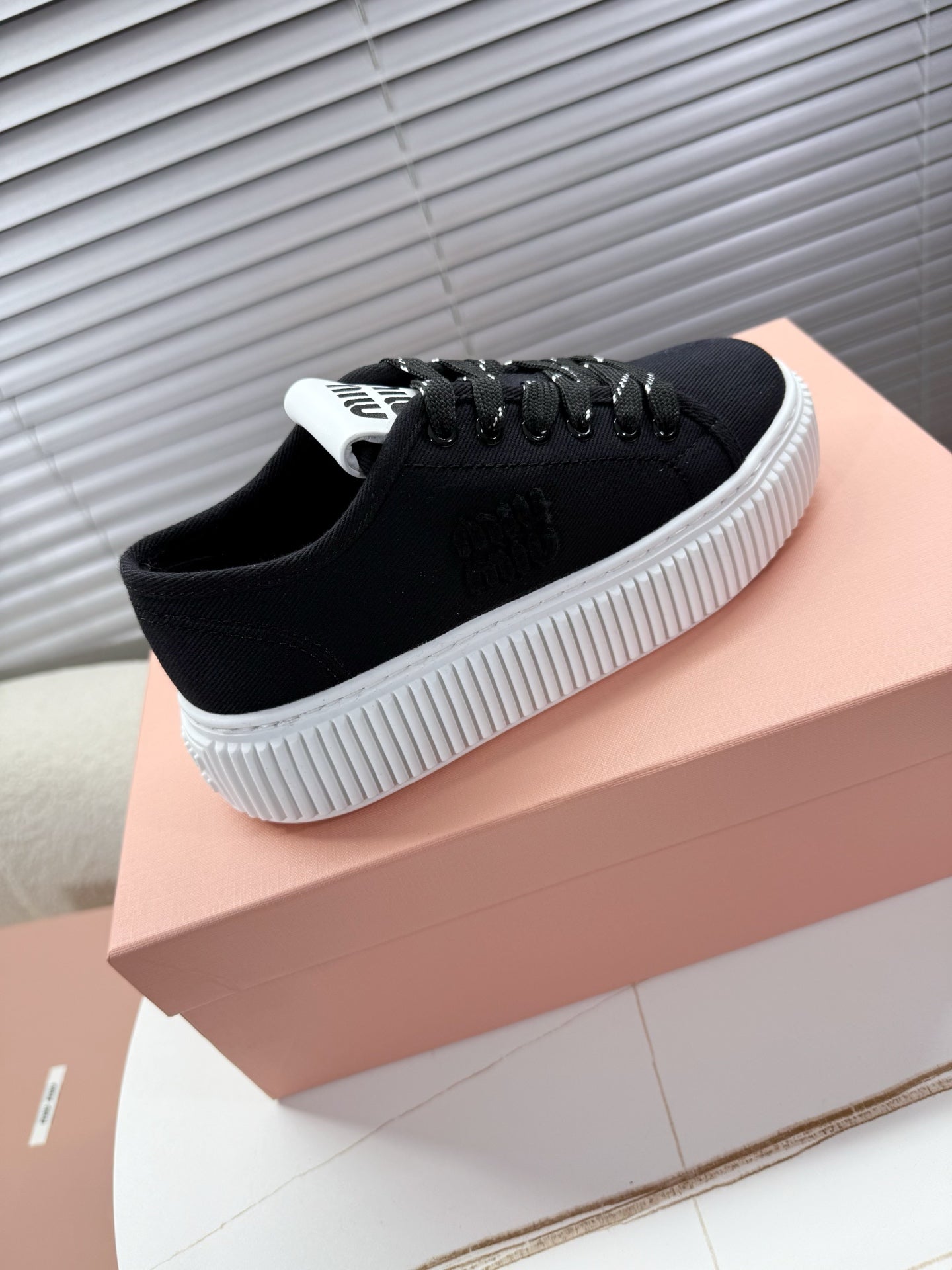 MIUMIU 26S PLATFORM SNEAKERS IN BLACK CANVAS