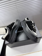 CHANEL 25S SNEAKERS 35MM IN BLACK AND WHITE CALFSKIN