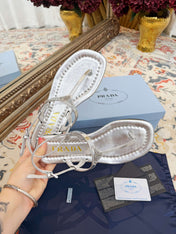 PRADA 26S THONG SANDALS IN SILVER CALFSKIN TRIANGLE LOGO