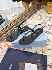 PRADA 26S THONG SANDALS IN BLACK CALFSKIN TRIANGLE LOGO