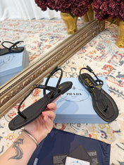 PRADA 26S THONG SANDALS IN BLACK CALFSKIN TRIANGLE LOGO