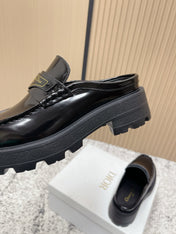 DIOR 25S BOY MULES IN BLACK CALFSKIN