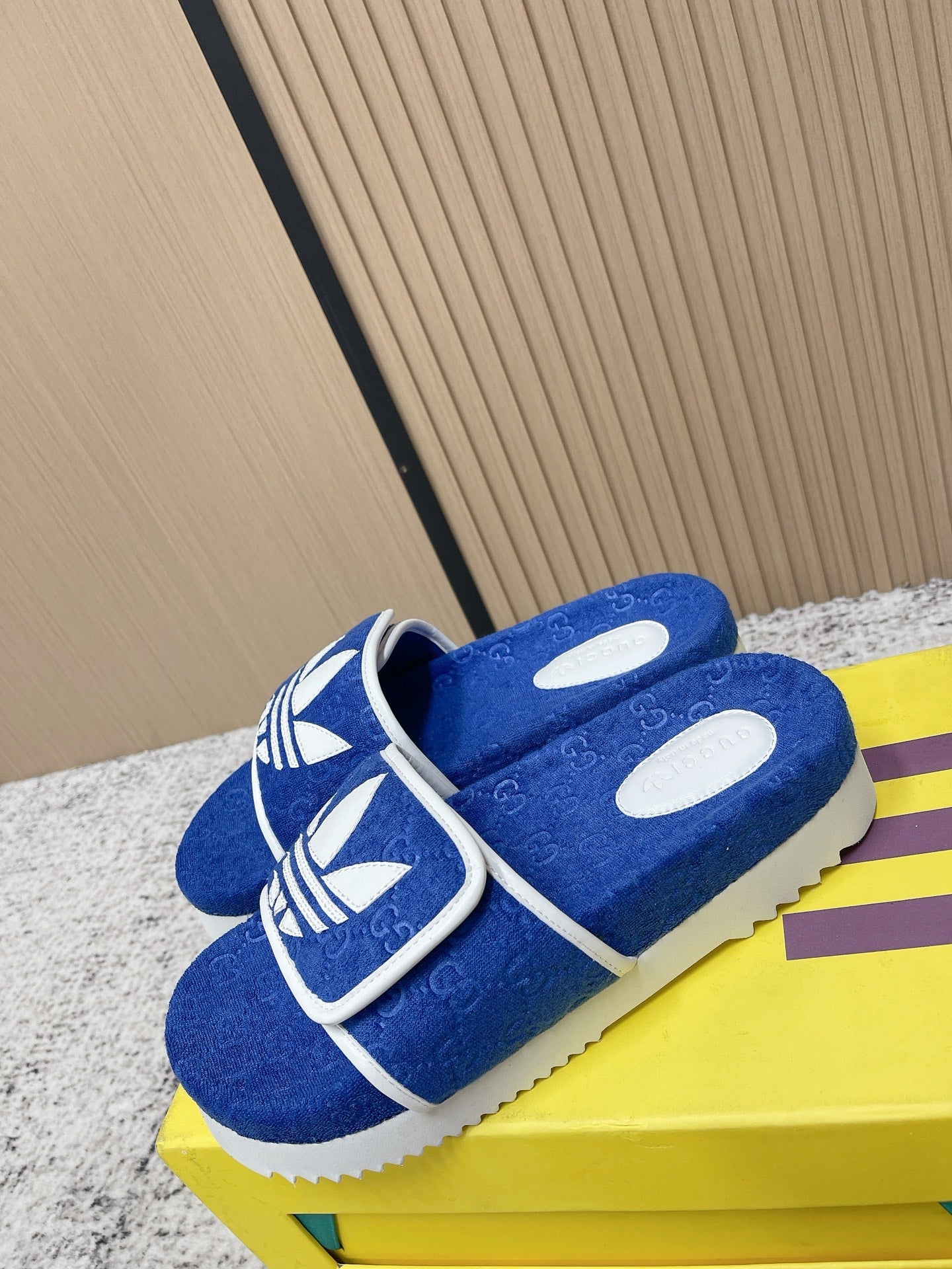 GUCCI 26S PLATFORM SLIDE SANDALS IN DARK BLUE FABRIC