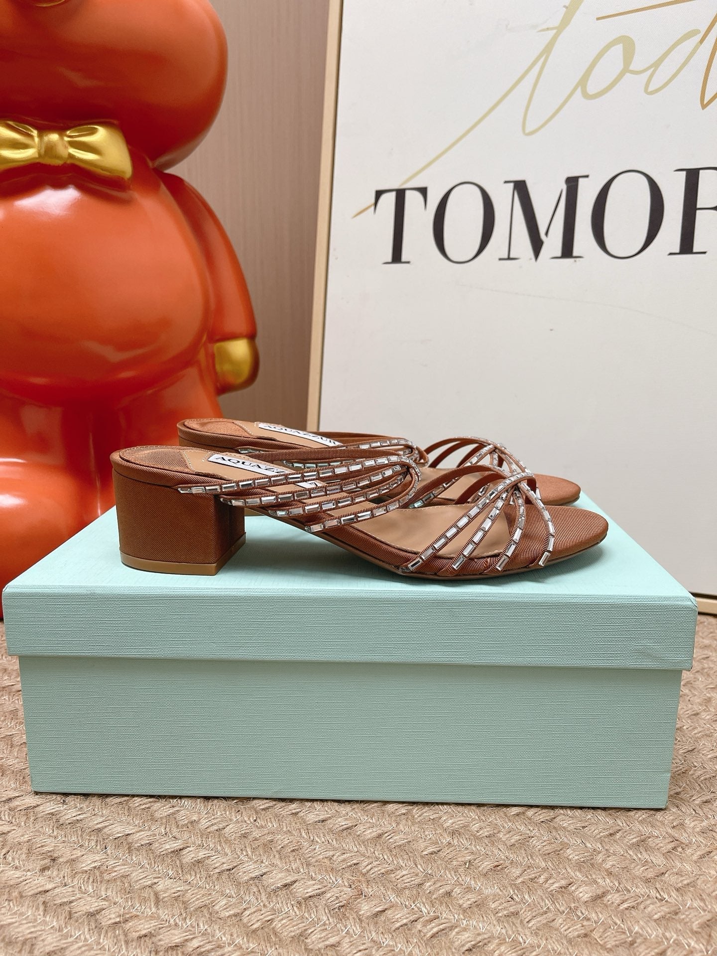 AQUAZZURA 26S CRYSTAL STRAP SANDALS 45 MM IN BROWN FABRIC