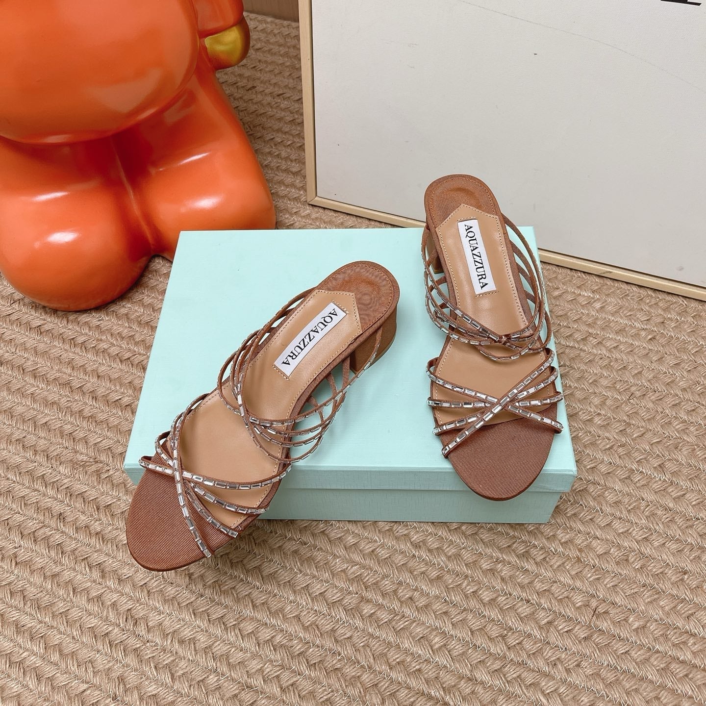 AQUAZZURA 26S CRYSTAL STRAP SANDALS 45 MM IN BROWN FABRIC