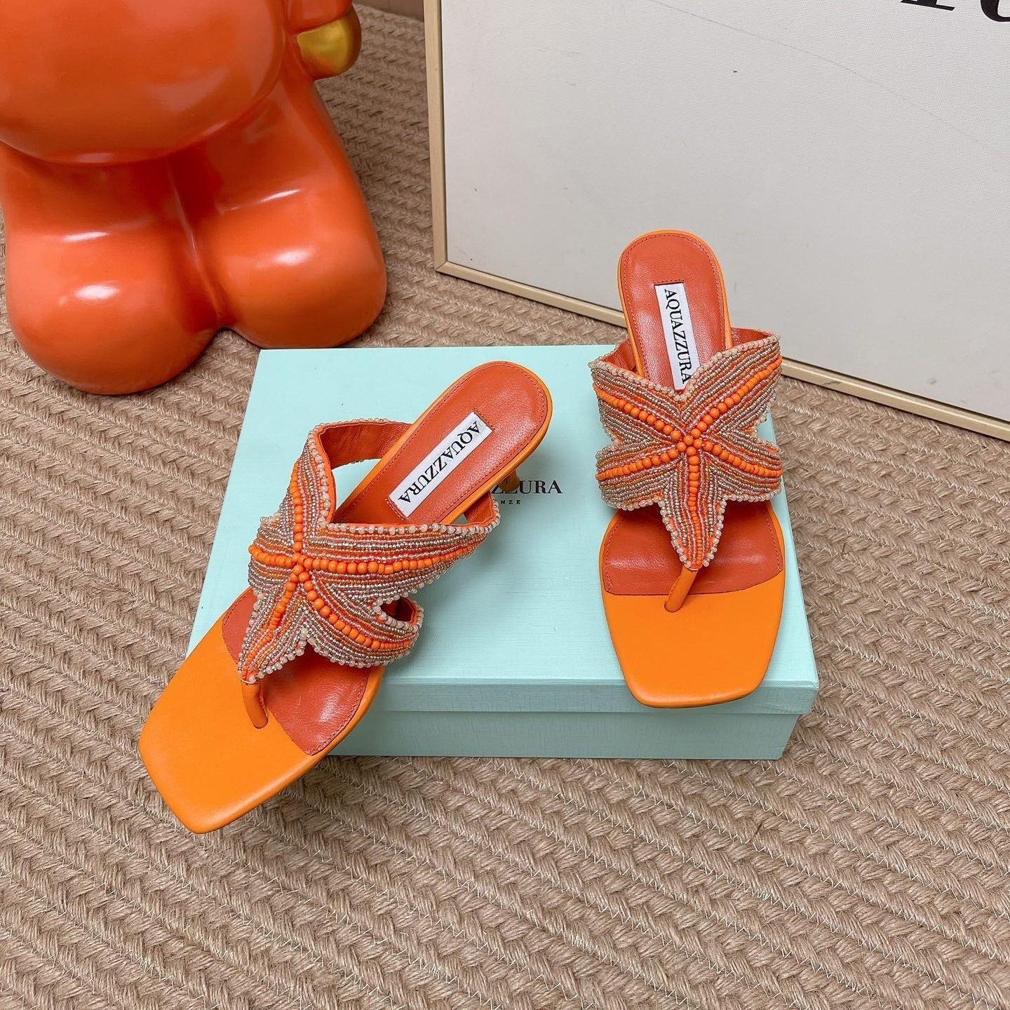 AQUAZZURA 26S STARFISH THONG HEELS IN ORANGE LAMBSKIN