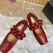 ALAIA MARY JANE PEARL IN GLOSSY MARS RED LAMBSKIN