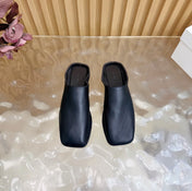 THE ROW 26S SQUARE TOE MULE FLATS IN BLACK CALFSKIN