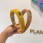 THICK HEADBAND IN YELLOW DIAGONAL LEATHER 425478