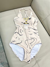 CC BIKINI SWIMSUIT SET IN CREAMY WHITE MIXED WITH CURVED BLACK DETAIL 608919