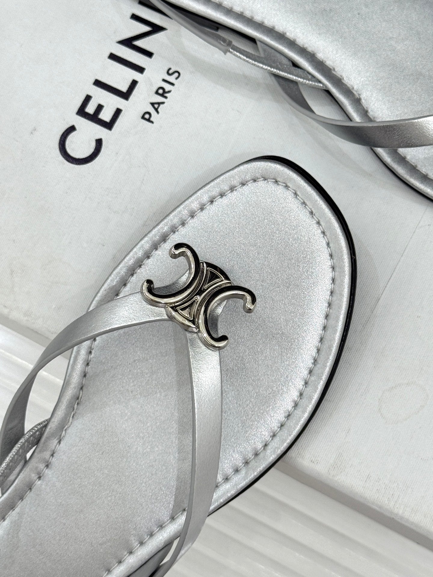 CELINE 26S THONG SANDALS IN SILVER CALFSKIN