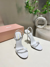 TWO STRAP HIGH HEELED SANDALS IN WHITE GLOSSY SHEEPSKIN