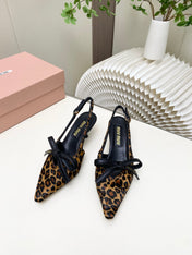 MIUMIU 26S SLINGBACK PUMPS 55MM IN LEOPARD PRINT CALF HAIR WITH BOW