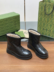 GG UGG BOOTS IN BLACK EMBOSSED SUEDE AND BEIGE WOOL LINING