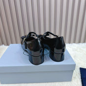 PRADA 26S T-STRAP MARY JANE PUMPS 40MM IN BLACK PATENT CALFSKIN WITH BOW