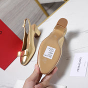 LV 26S SLINGBACK PUMPS 55MM IN GOLD PATENT CALFSKIN WITH BOW
