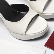 GUCCI 26S HEELED SLIDE SANDALS 120MM IN WHITE PATENT CALFSKIN