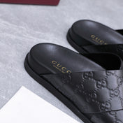 GUCCI 26S CROSSOVER SANDALS IN BLACK GG EMBOSSED CALFSKIN