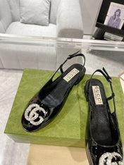 METALIC SLINGBACK FLATS IN BLACK CALFSKIN