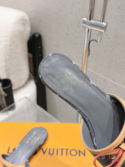 LV 26S FLAT MULE SANDALS IN BLACK MONOGRAM DENIM WITH CALFSKIN BOW