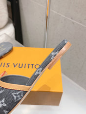 LV 26S FLAT MULE SANDALS IN BLACK MONOGRAM DENIM WITH CALFSKIN BOW