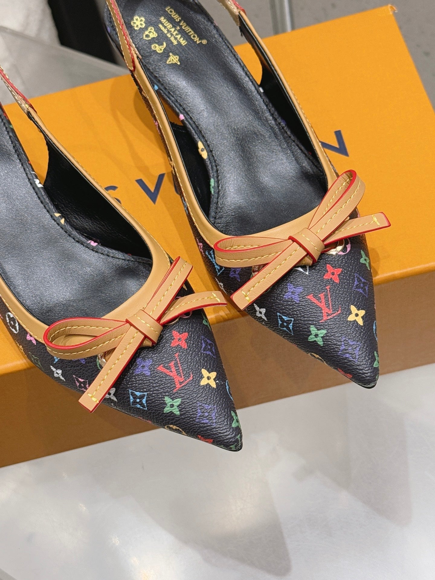 LV 26S SLINGBACK PUMPS IN BLACK MULTICOLOR MONOGRAM CANVAS WITH CALFSKIN BOW