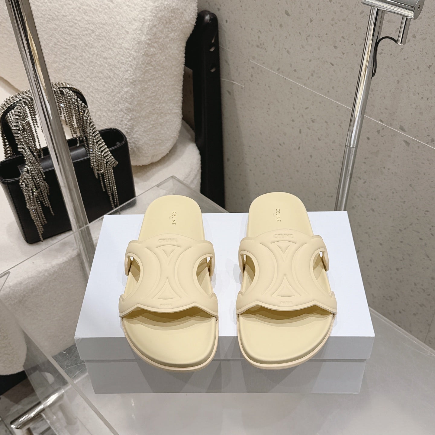 CELINE 26S TRIOMPHE SLIDES IN PASTEL YELLOW CALFSKIN