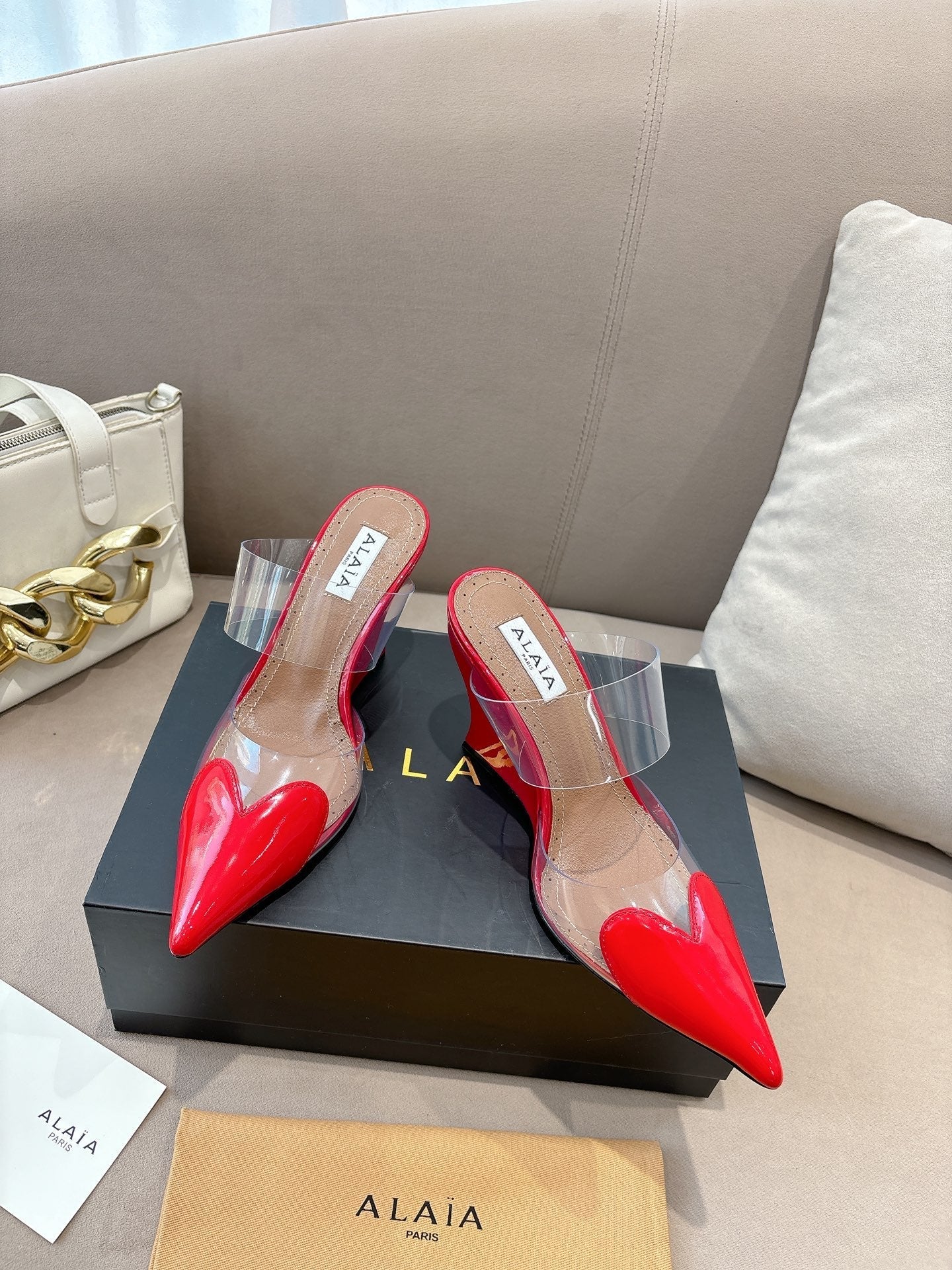 ALAIA 26S HIGH-HEEL WEDGE MULES 95 MM IN RED GLOSSY CALFSKIN