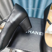 HIGH MARY JANE SHOES BLACK SHEEPSKIN WITH WHITE BOW