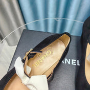 HIGH MARY JANE SHOES BLACK SUEDE WITH WHITE BOW