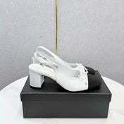 CHANEL 26S SLINGBACK HEELS 45 MM IN WHITE LAMBSKIN AND BLACK FABRIC