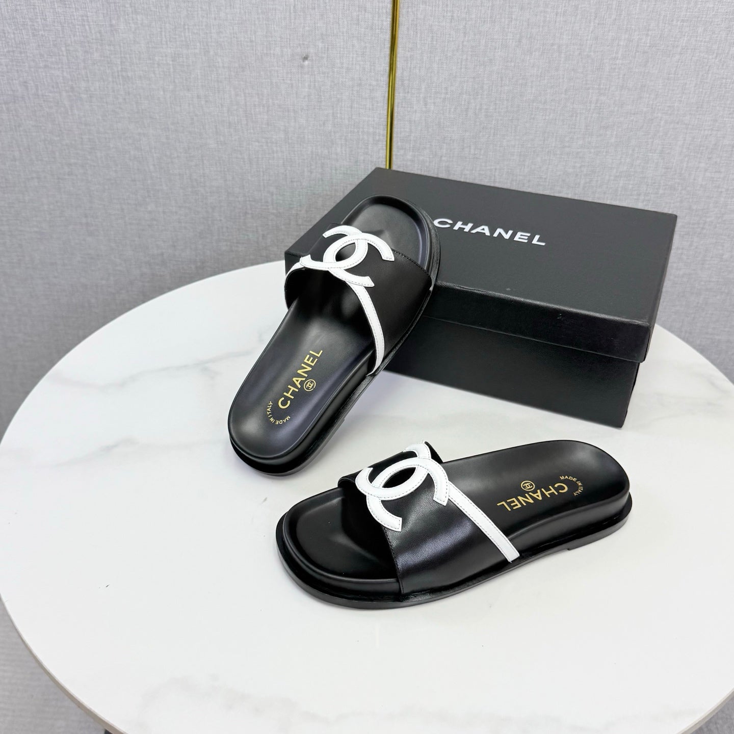 CHANEL 26S ICONIC CC SLIDES IN BLACK LAMBSKIN