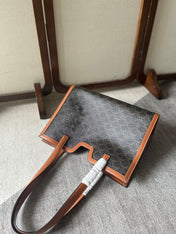 CABAS 37 IN BLACK TRIOMPHE CANVAS AND BRONZE BROWN CALFSKIN TRIM GOLD LOCK